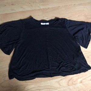 Solid black bell-sleeved crop top